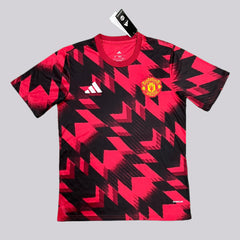 RED AND BLACK MANCHESTER UNITED TRAINING SHIRT 25/26